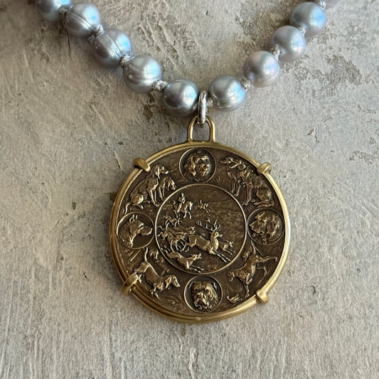 Hunting in the Round Medal on Pearl Necklace