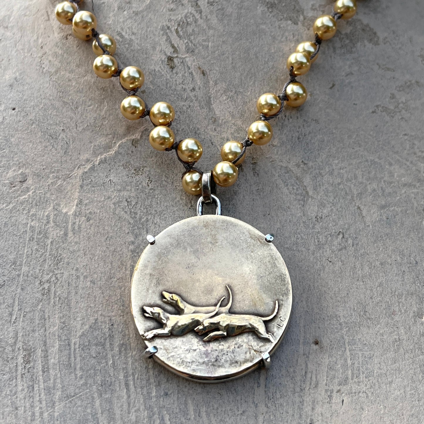 Full Cry Medal on Gold Pearls