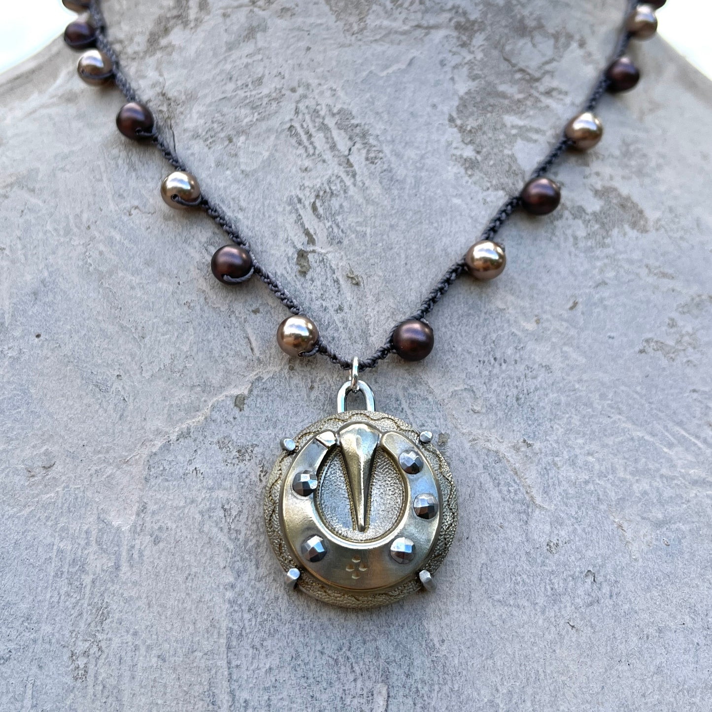 Vintage Brass and Steel Cuts Horseshoe Button Necklace