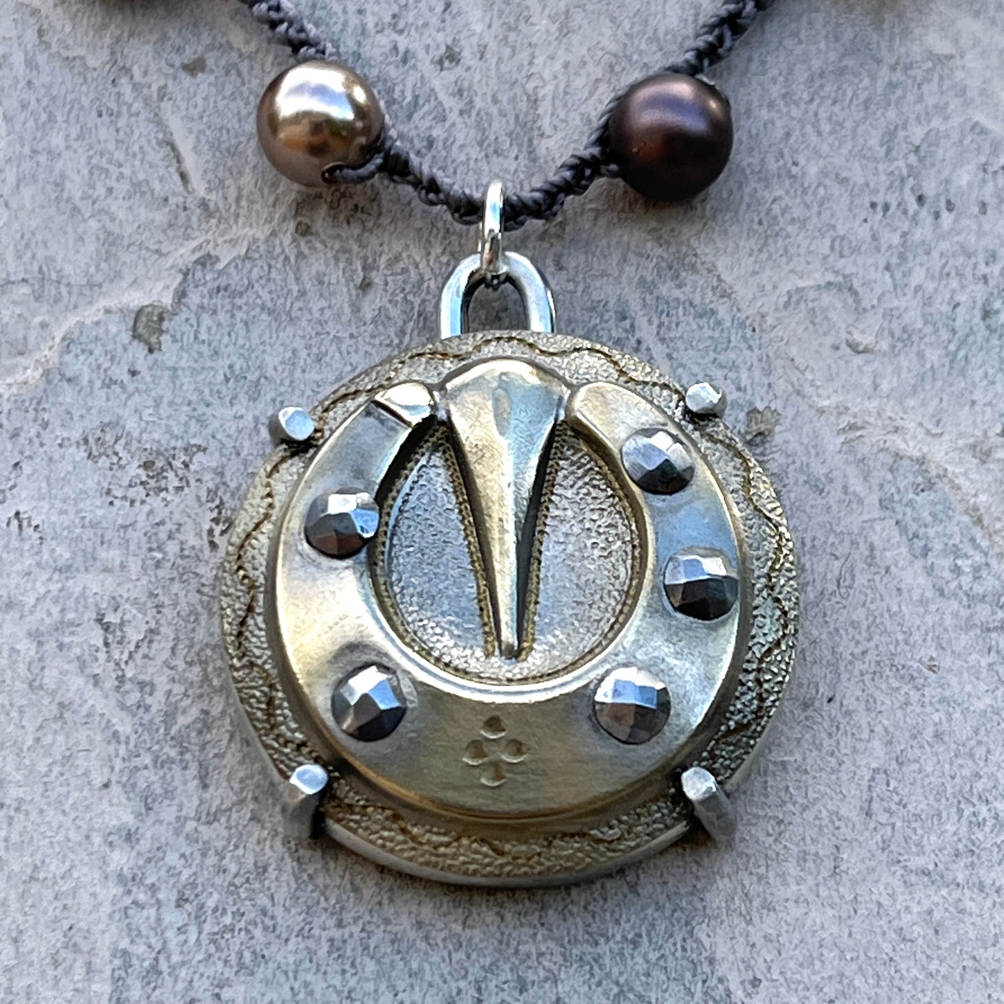 Vintage Brass and Steel Cuts Horseshoe Button Necklace