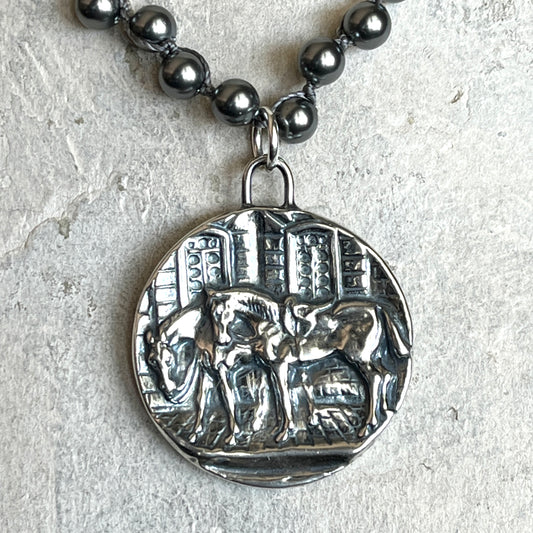 All Saddled Up on Pearl Necklace