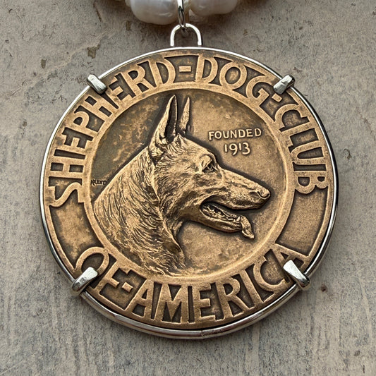 Bronze Shepherd Dog on Pearl Necklace