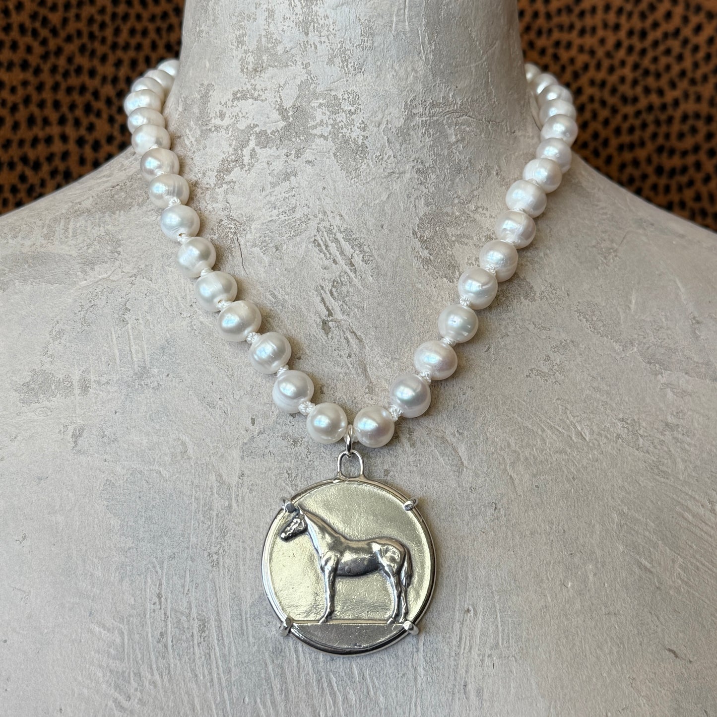 Standing Horse Medal on Pearl Necklace