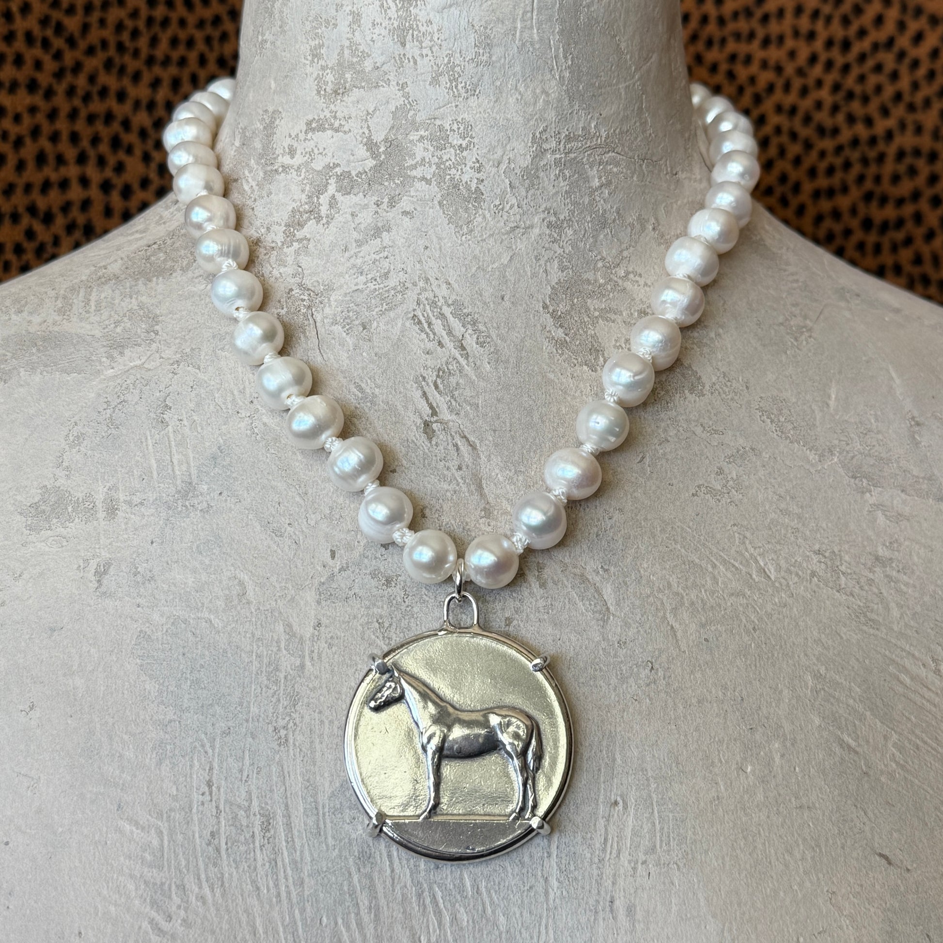 Standing Horse Medal on Pearl Necklace