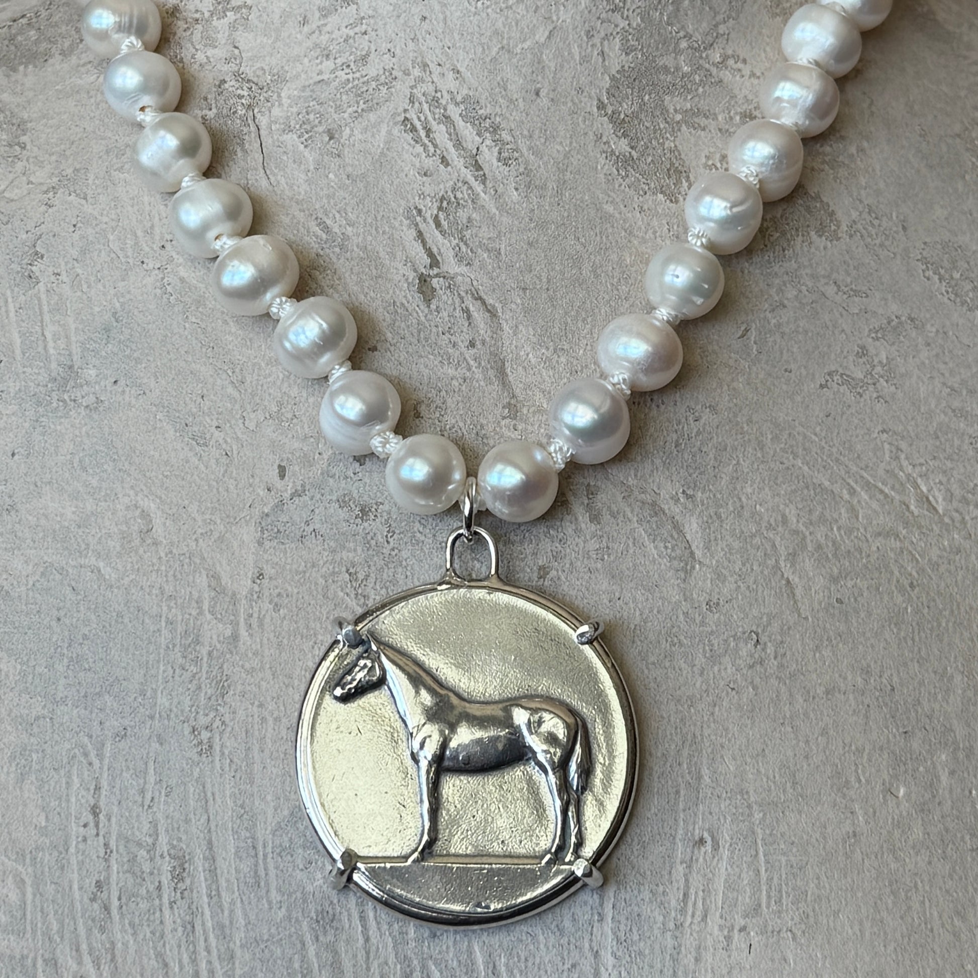 Standing Horse Medal on Pearl Necklace