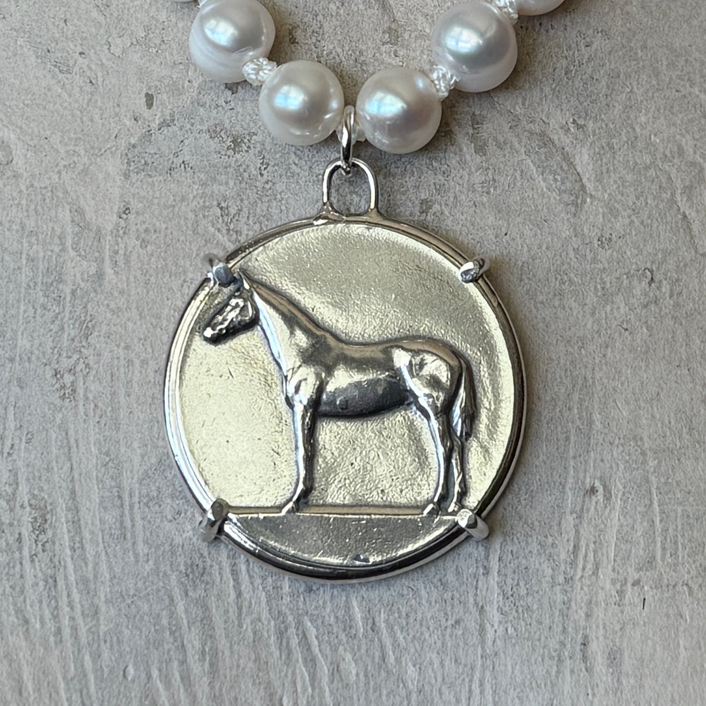 Standing Horse Medal on Pearl Necklace