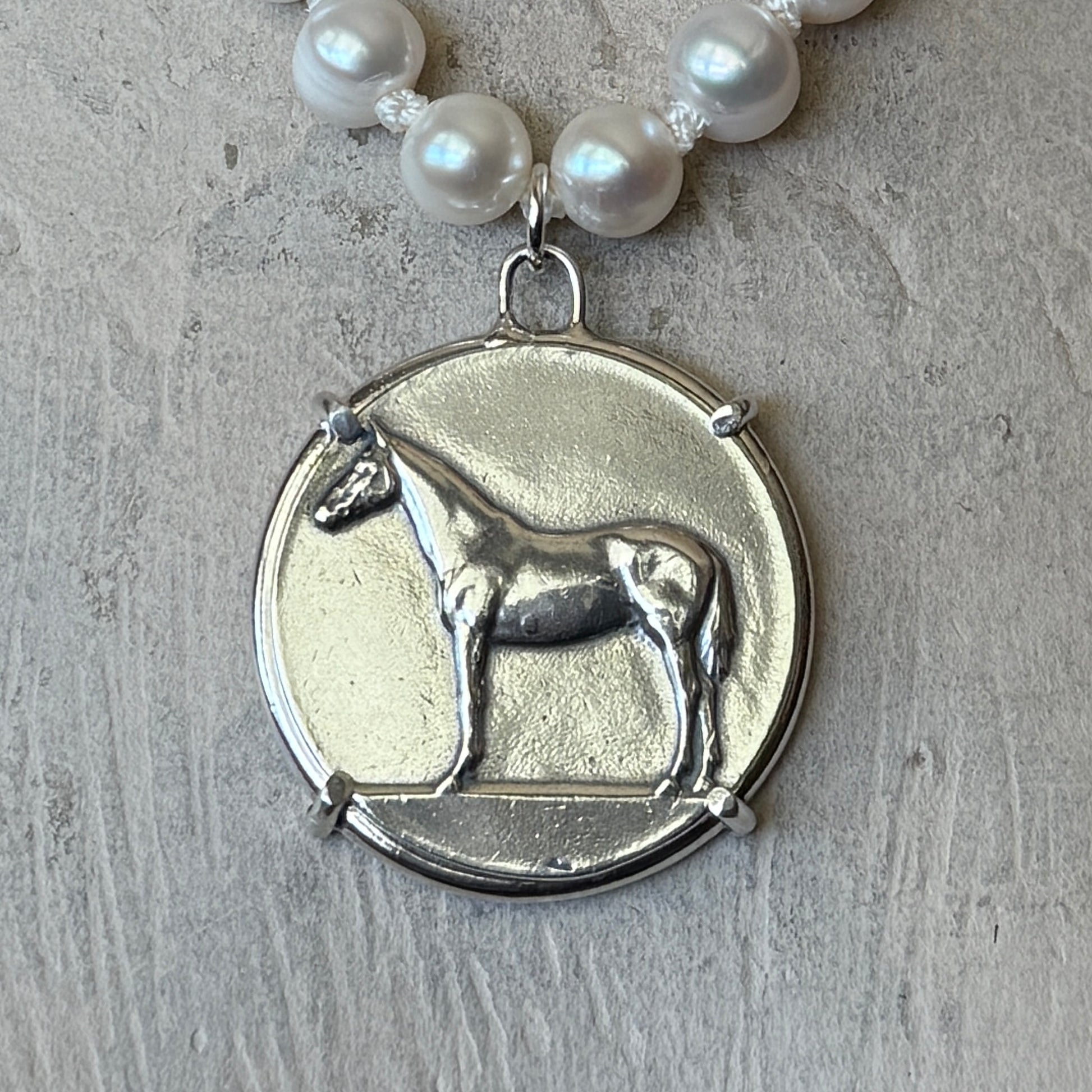 Standing Horse Medal on Pearl Necklace