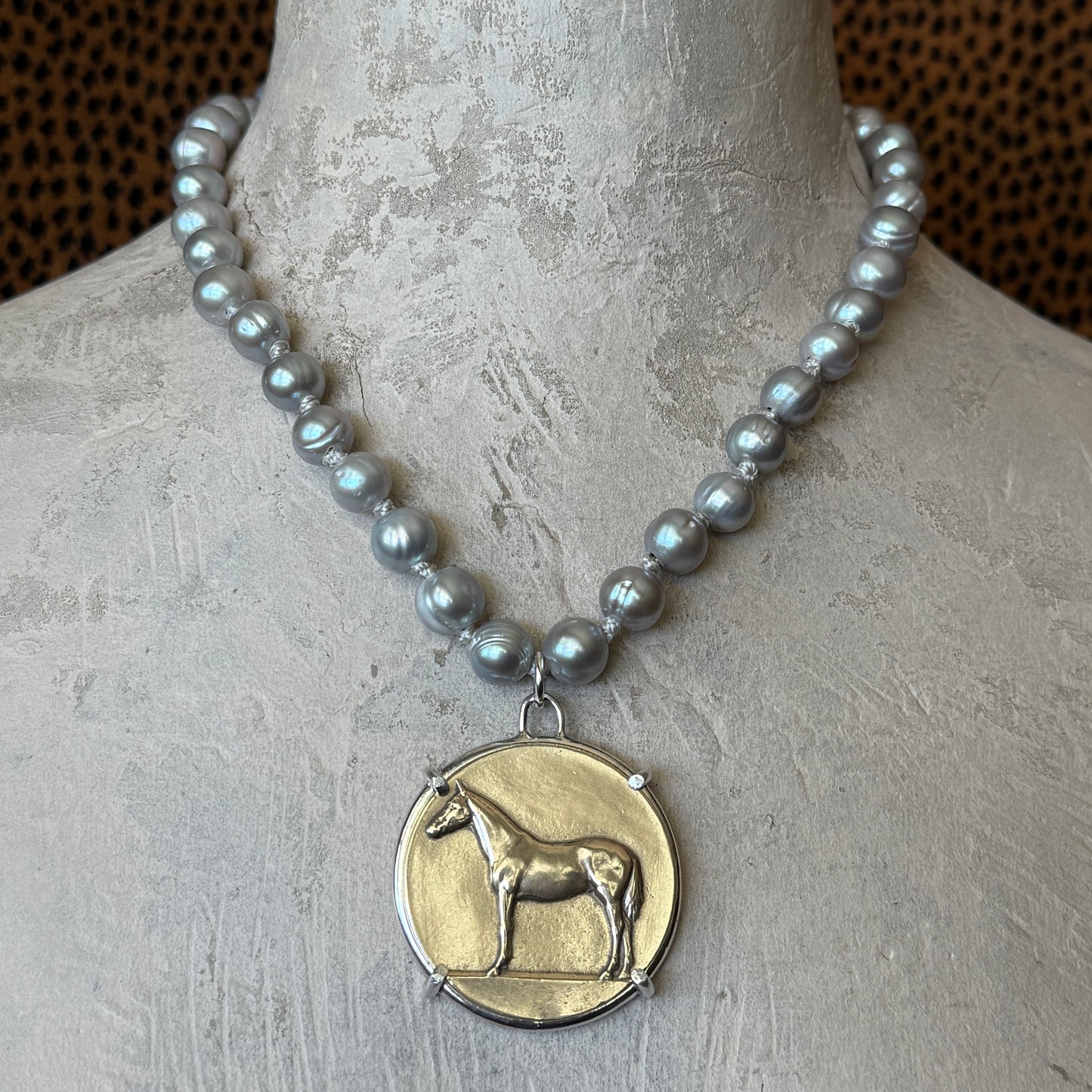 Standing Horse Medal on Pearl Necklace
