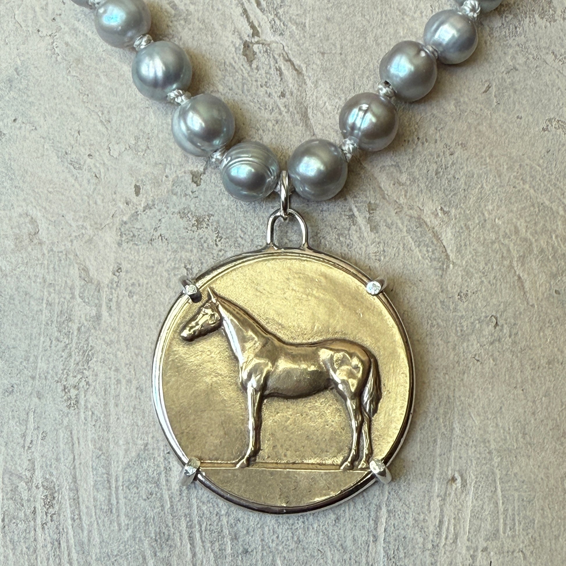 Standing Horse Medal on Pearl Necklace