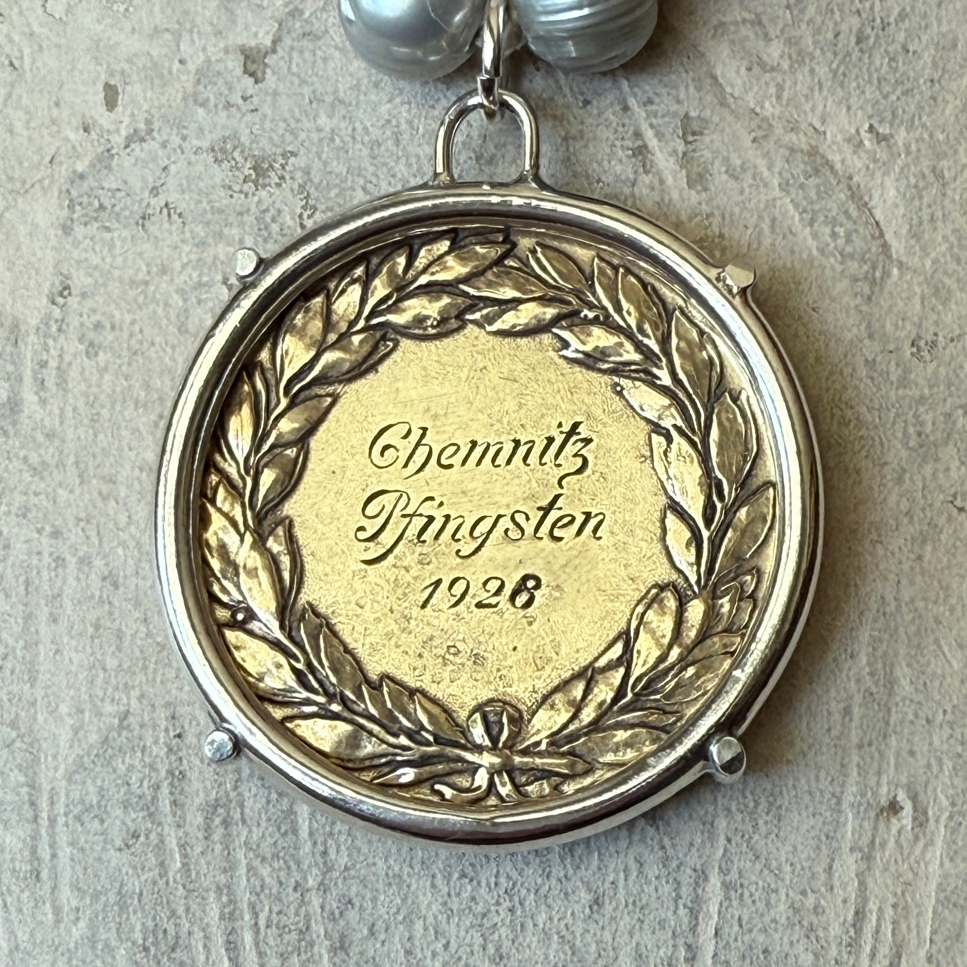 Standing Horse Medal on Pearl Necklace