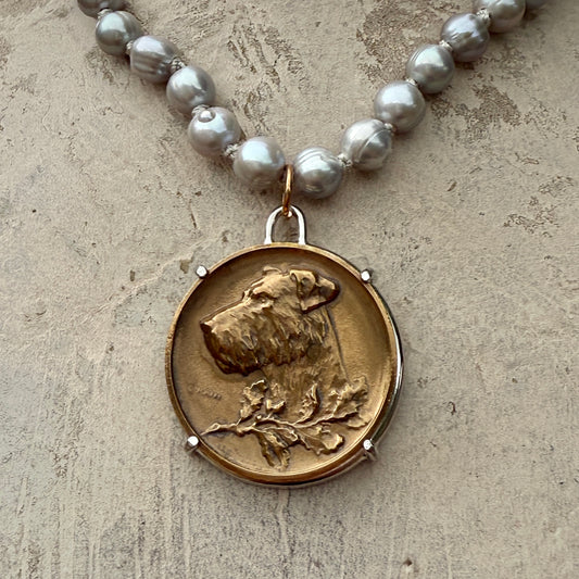Bronze Dog Medal on White Pearls