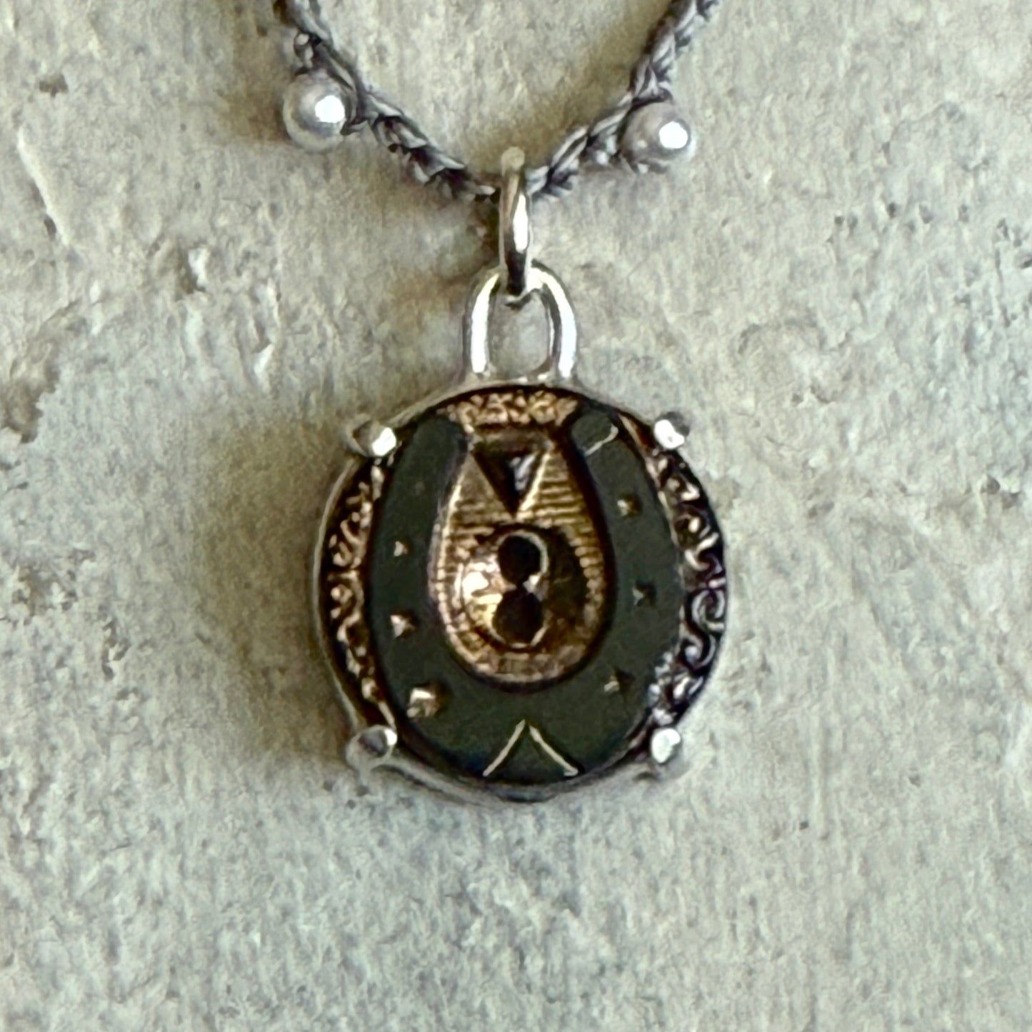 Little Lovely Gilded Jet Horseshoe Necklace