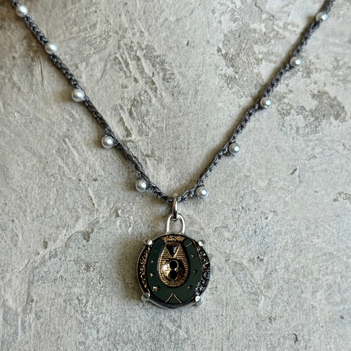 Little Lovely Gilded Jet Horseshoe Necklace