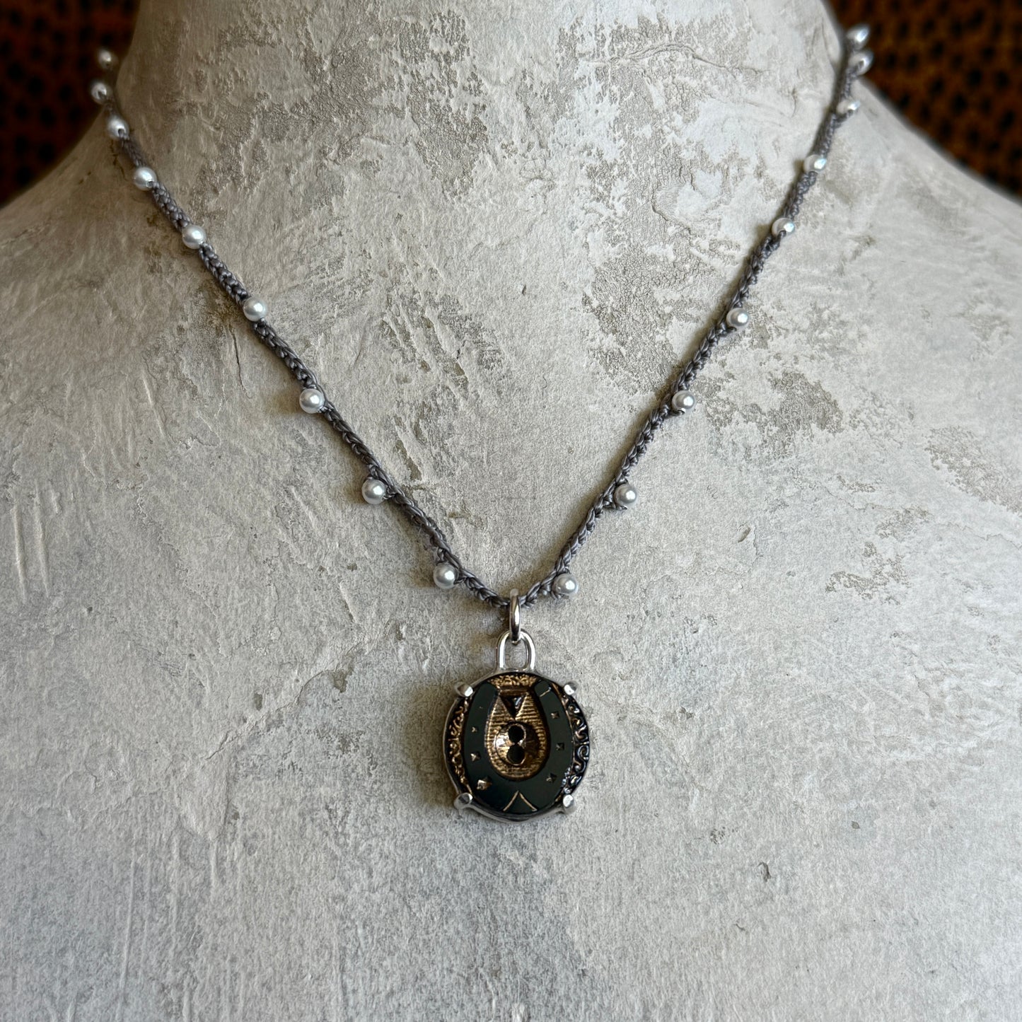 Little Lovely Gilded Jet Horseshoe Necklace