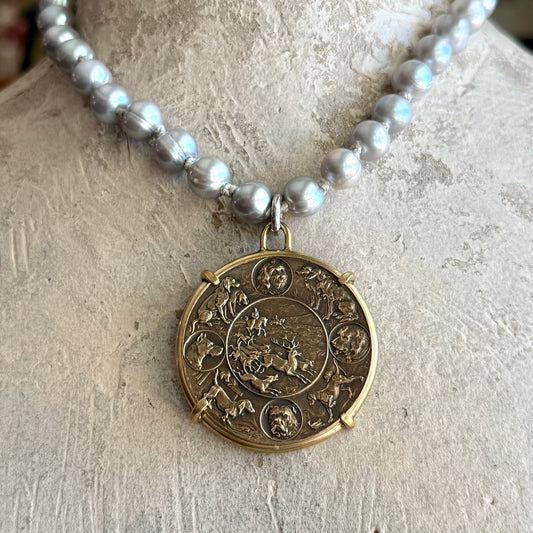 Hunting in the Round Medal on Pearl Necklace