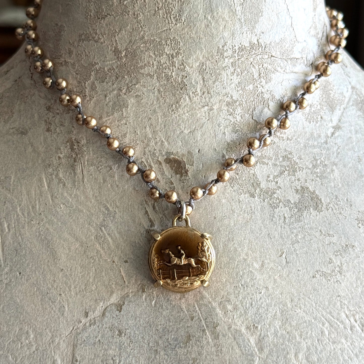 Tinted Brass Galloping Horse Button Necklace