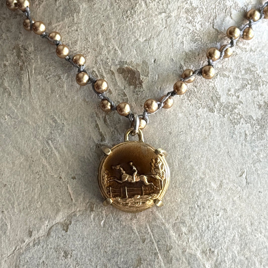 Tinted Brass Galloping Horse Button Necklace