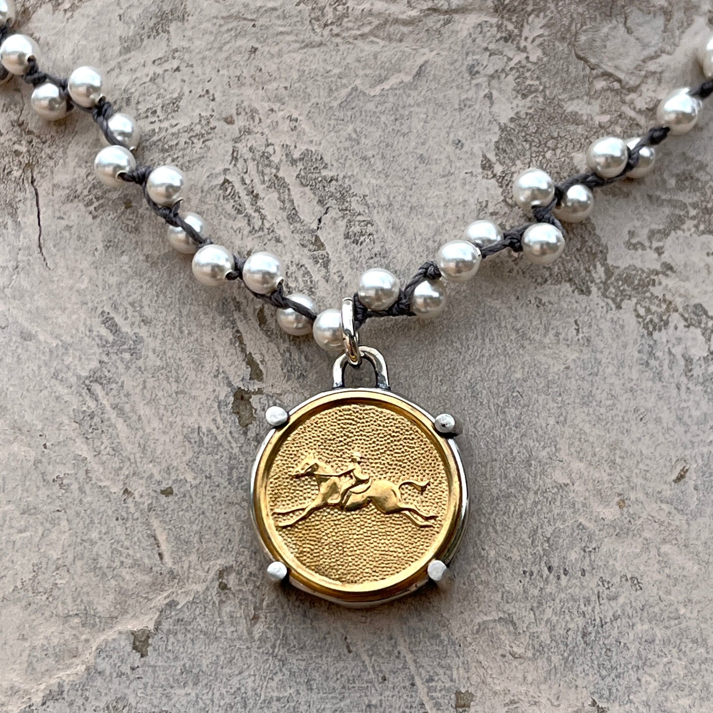 Brass Galloping Horse Button on White Pearl Necklace