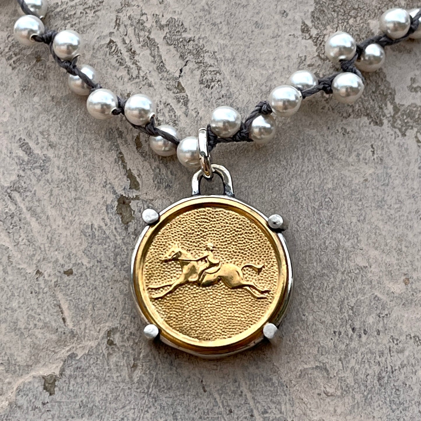 Brass Galloping Horse Button on White Pearl Necklace