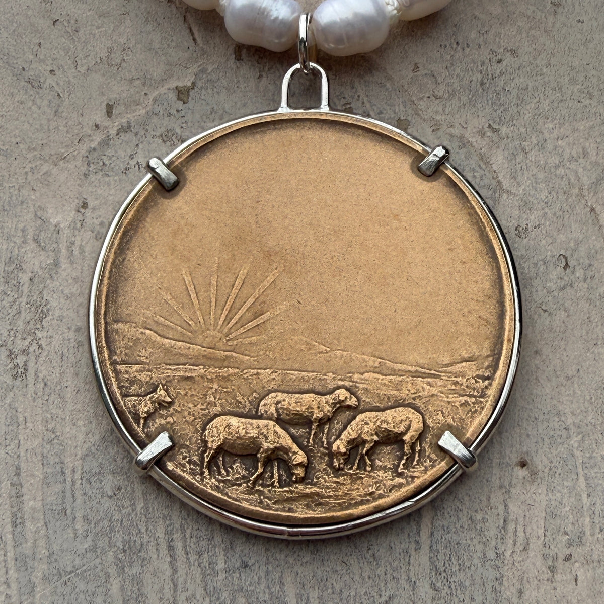 Bronze Shepherd Dog on Pearl Necklace